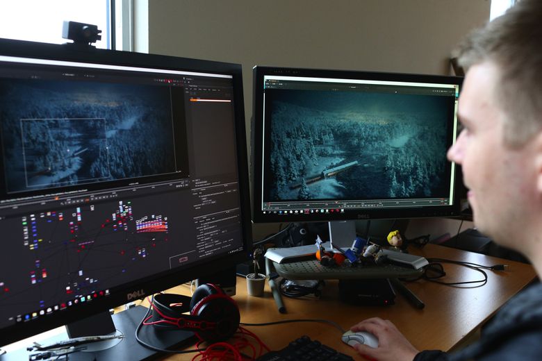 Gavin Greenwalt, visual effects artist, works on the lighting of the Nutcracker Overture video. The video features 1.5 million 3-D trees, 27 million snowflakes, 8,540 3-D bushes, 287 3-D buildings and seven 3-D mice. (John Lok/The Seattle Times)