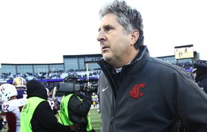 Washington State head coach Mike Leach walks off the field after his team’s loss during the 108th Apple Cup at Husky Stadium on Friday, Nov. 27, 2015. Washington beat Washington State 45-10.