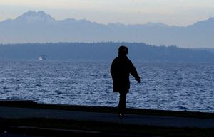 November 26, 2002 Suzanne Forselius takes a winter walk along Alki Beach with the Olympic Mountains as a backdropWinterWalk