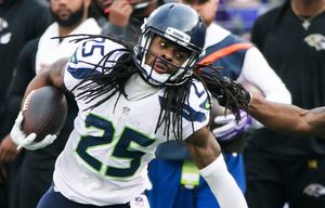 Seattle Seahawks cornerback Richard Sherman (25) intercepts the