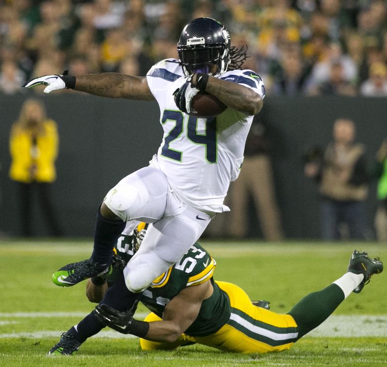 Seahawks running back Marshawn Lynch breaks free in the first quarter against the Green Bay Packers earlier this season. (Dean Rutz / Seattle Times staff)