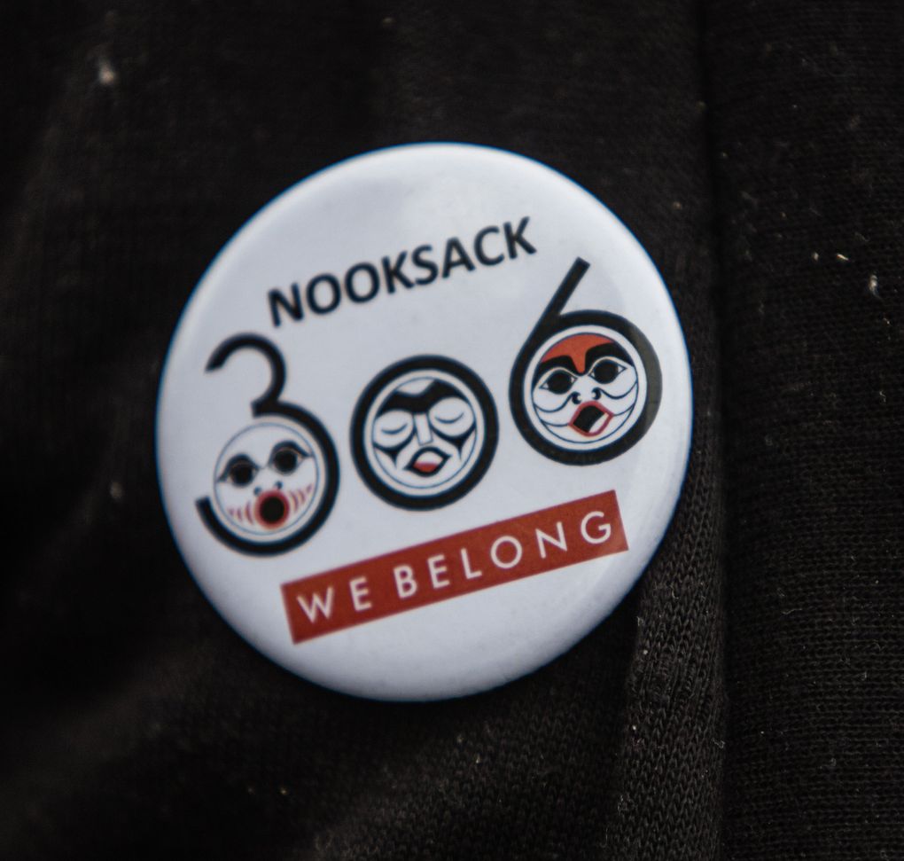 Many of the 306 Nooksack tribal members facing disenrollment wear this button. (Steve Ringman / The Seattle Times)
