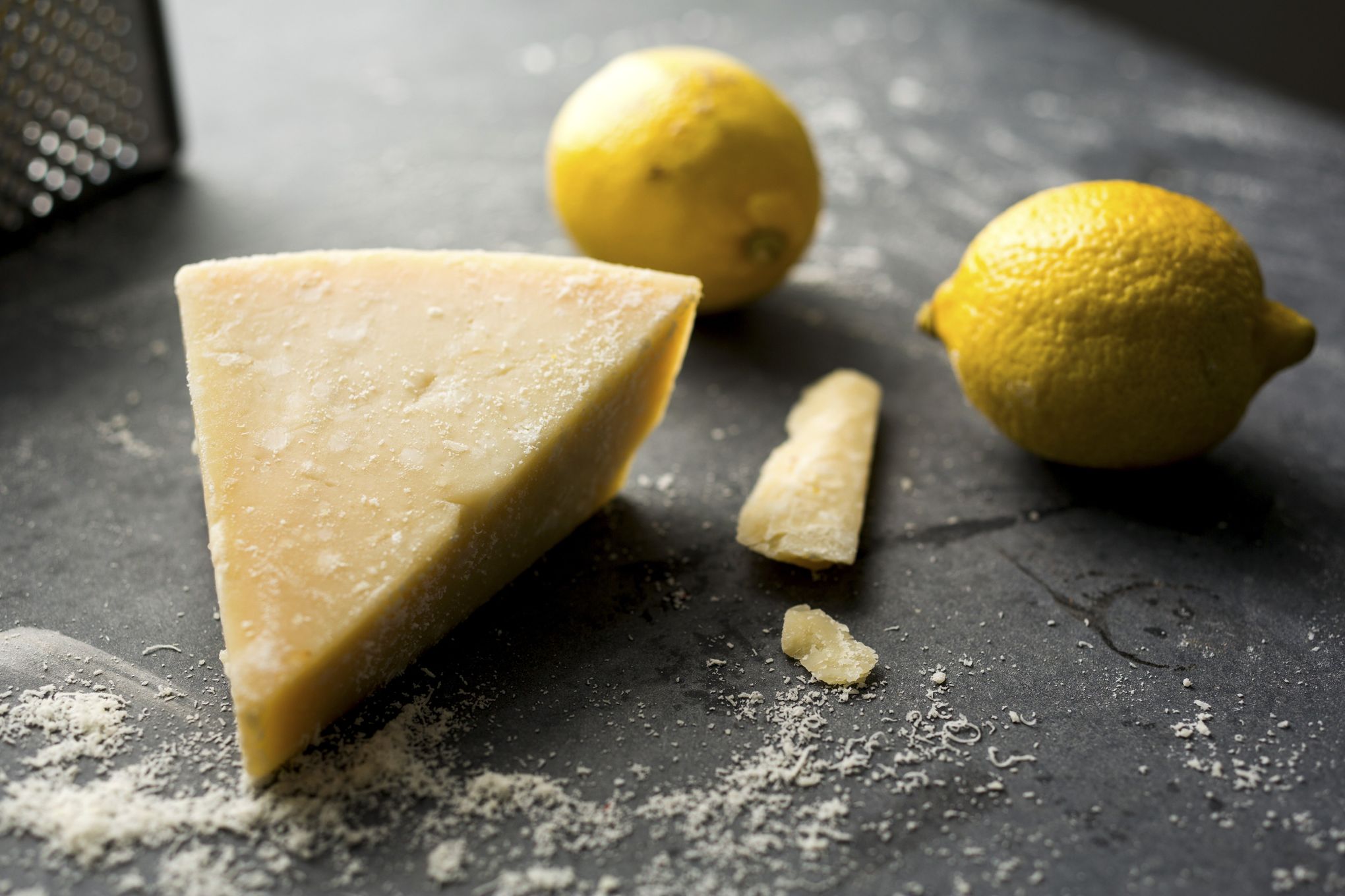 Cheese replica Parmesan Reggiano, with dish