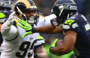 Seahawks running back Bryce Brown runs the ball for a loss of 5 yards in the second quarter at CenturyLink Field on Sunday, December 27, 2015, in Seattle, Wash.
