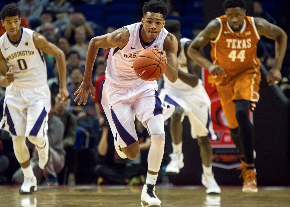 Freshman Dejounte Murray pushes the ball down court during the Washington Huskies’ season opener against Texas in Shanghai. (Kaia D’Albora)