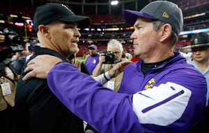 ATLANTA, GA – NOVEMBER 29: Head coach Dan Quinn of the Atlanta Falcons shakes hands with head coach Mike Zimmer of the Minnesota Vikings after the game at the Georgia Dome on November 29, 2015 in Atlanta, Georgia.  (Photo by Kevin C. Cox/Getty Images)