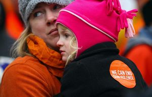 Sarah Ramsay (cq) and her daughter, Clementine Ramsay (cq), 4, were among those that gathered at Green Lake at an event to end gun violence on Sunday, December 13, 2015, in Seattle. MARCH TO END GUN VIOLENCE – GREEN LAKE – 152170 – 121315
