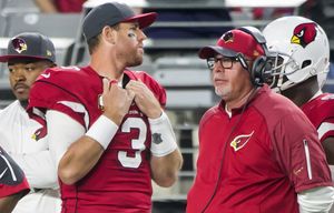 Cardinals quarterback Carson Palmer and Head Coach Bruce Arians don’t look pleased with the Seahawks’ 30-point lead in the second half as the Seattle Seahawks defeated the Arizona Cardinals 36-6 Sunday January 3, 2016 at University of Phoenix Stadium in Glendale.