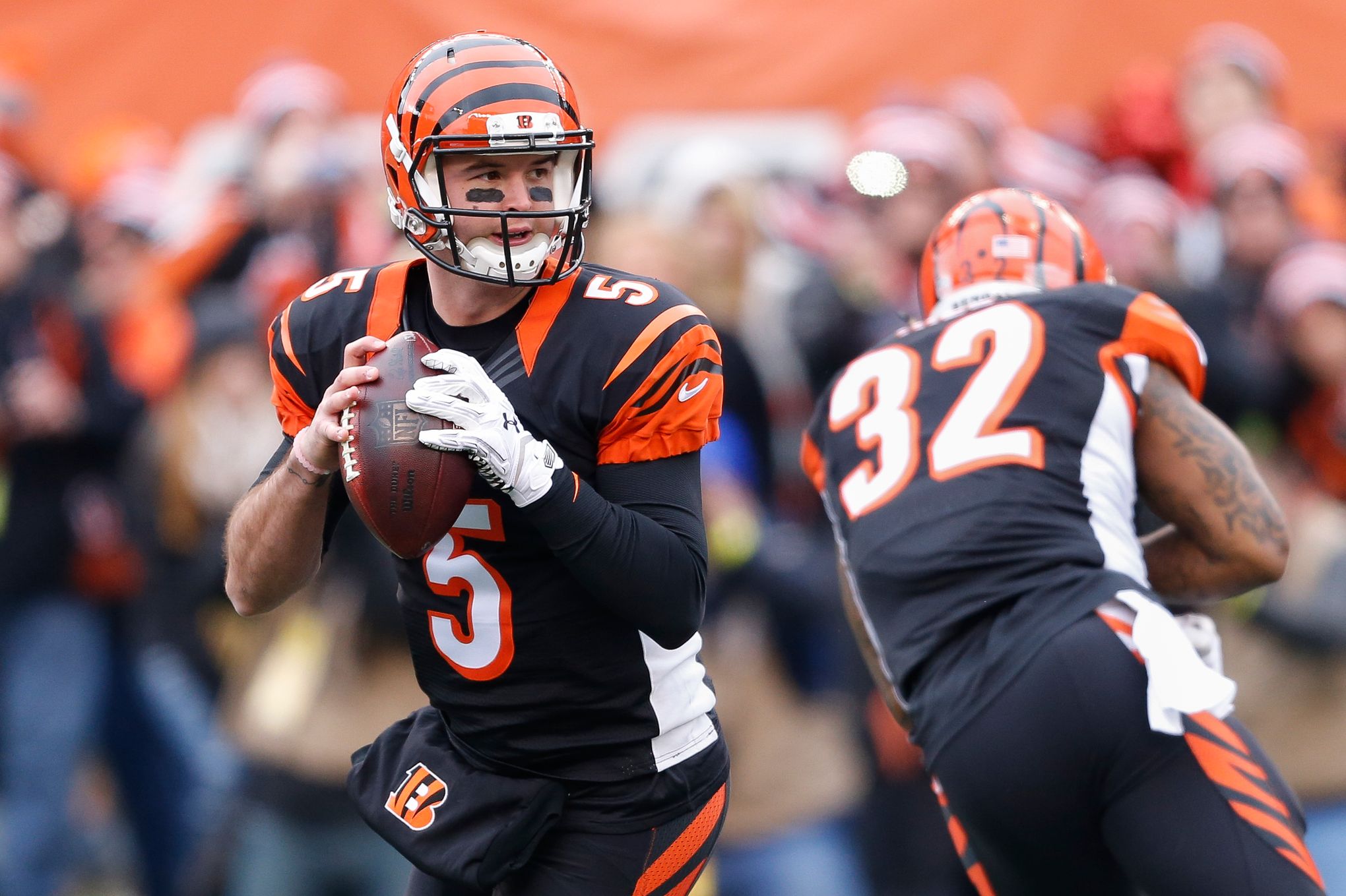 Andy Dalton of the Cincinnati Bengals attempts to break a tackle