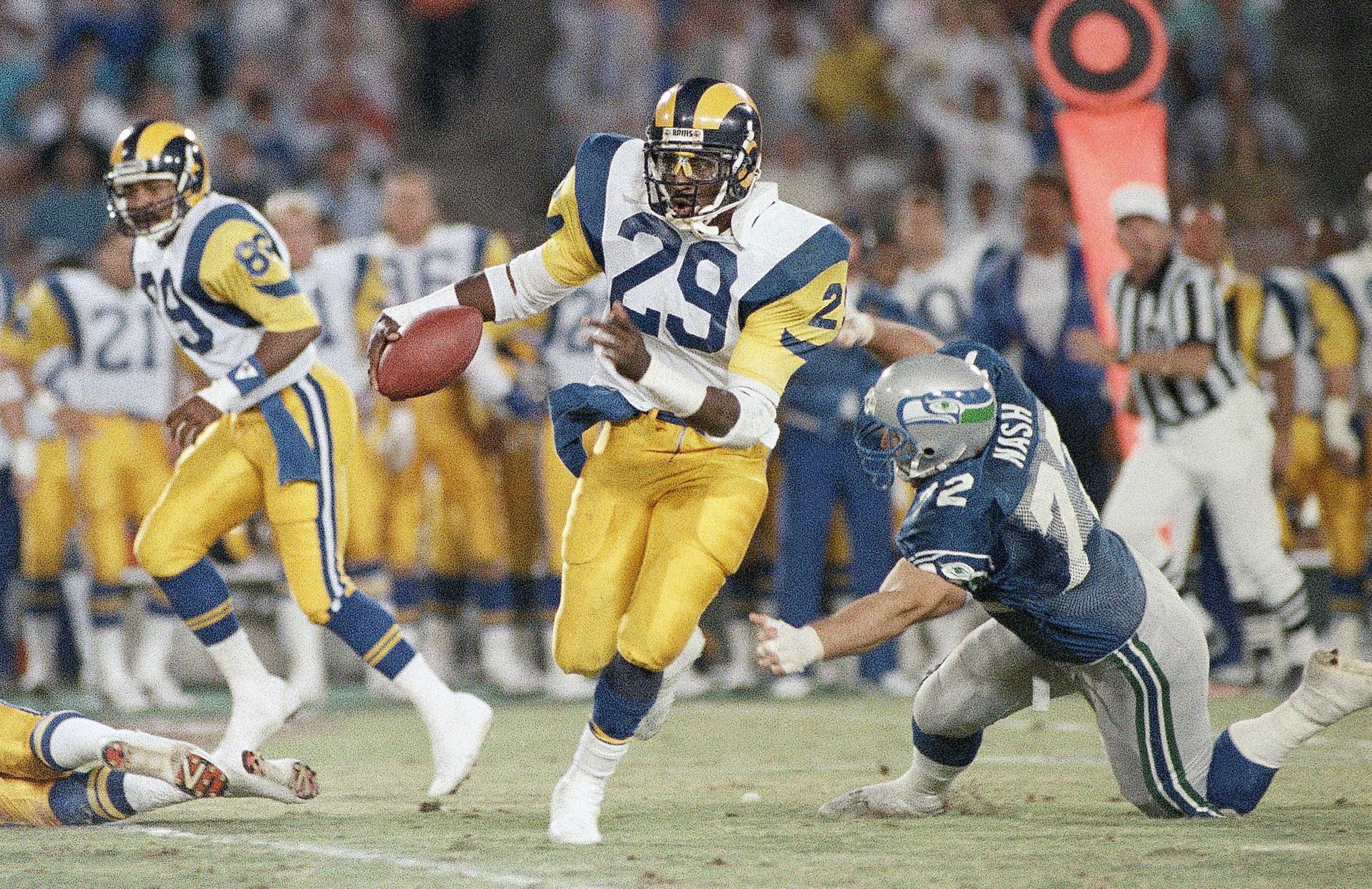 Los Angeles Rams Eric Dickerson (29) stares straight past New York