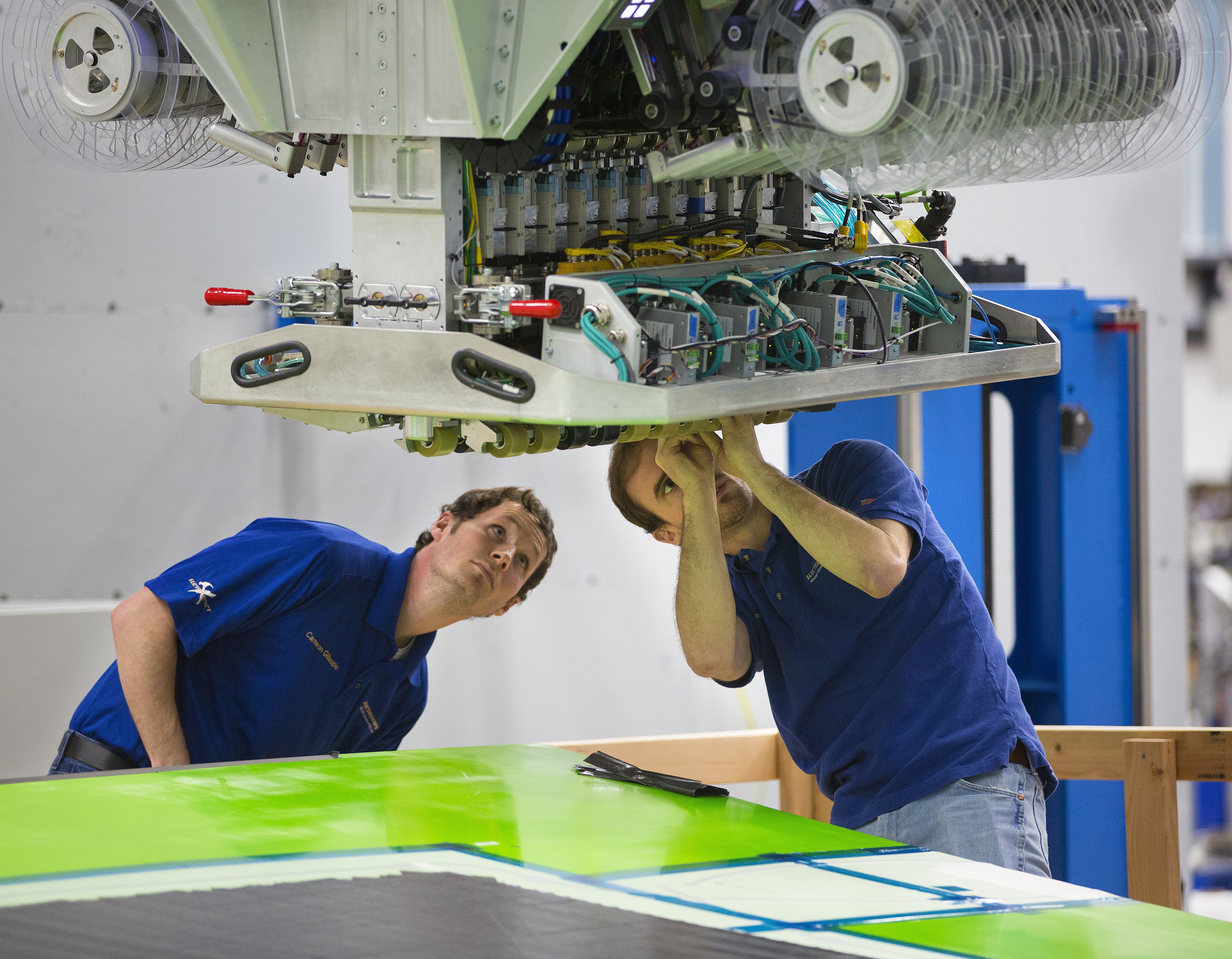 Massive, speedy robots ready to build composite wings for Boeing