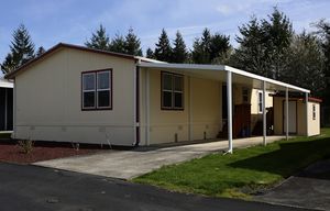 Ellie Carosa’s Napavine mobile home, Fri., March 27, 2015. Carosa had hoped to eventually sell the house so the money could help her biological granddaughter attend a local college. Carosa adopted the girl as her daughter at age 8.
