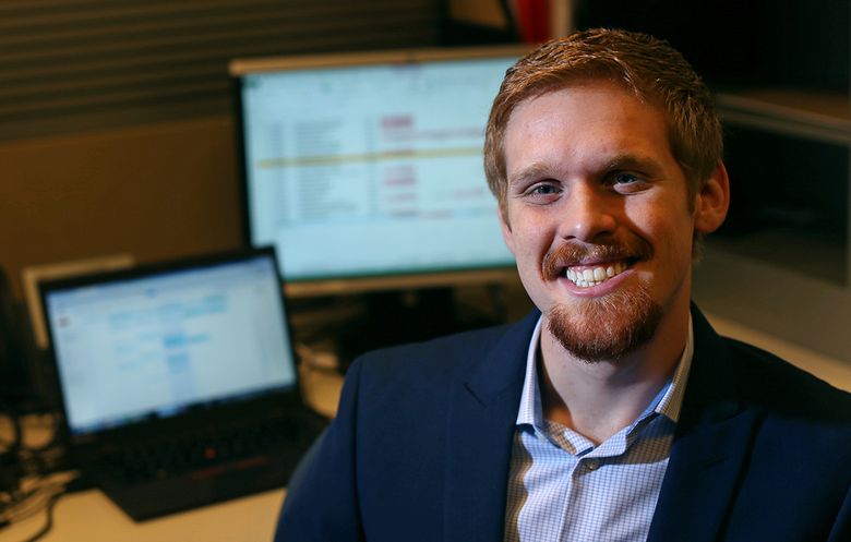 Scott Papez was recently hired to work in the Minneapolis office of PwC. The consulting giant offers $1,200 a year for up to six years to help pay off student loans. (Jerry Holt / Minneapolis Star Tribune via TNS)