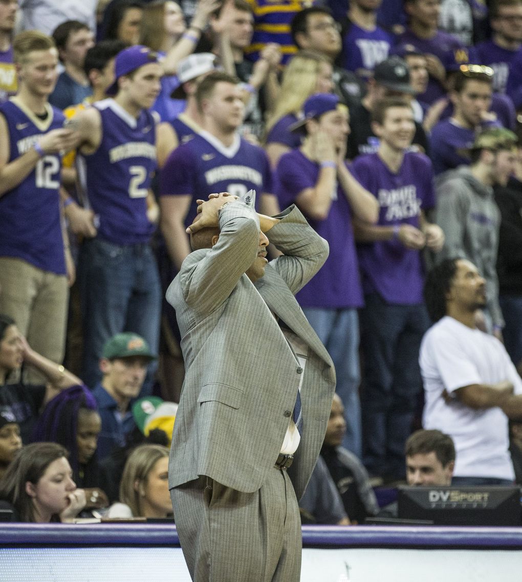 Lorenzo Romar reacts to a turnover that goes against Washington in the second half. (Dean Rutz / The Seattle Times)