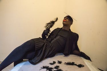 Gary Beeber’s “Early Ross with black feather, NYC” (2015), digital color print in CoCA’s show. (Courtesy of the artist)