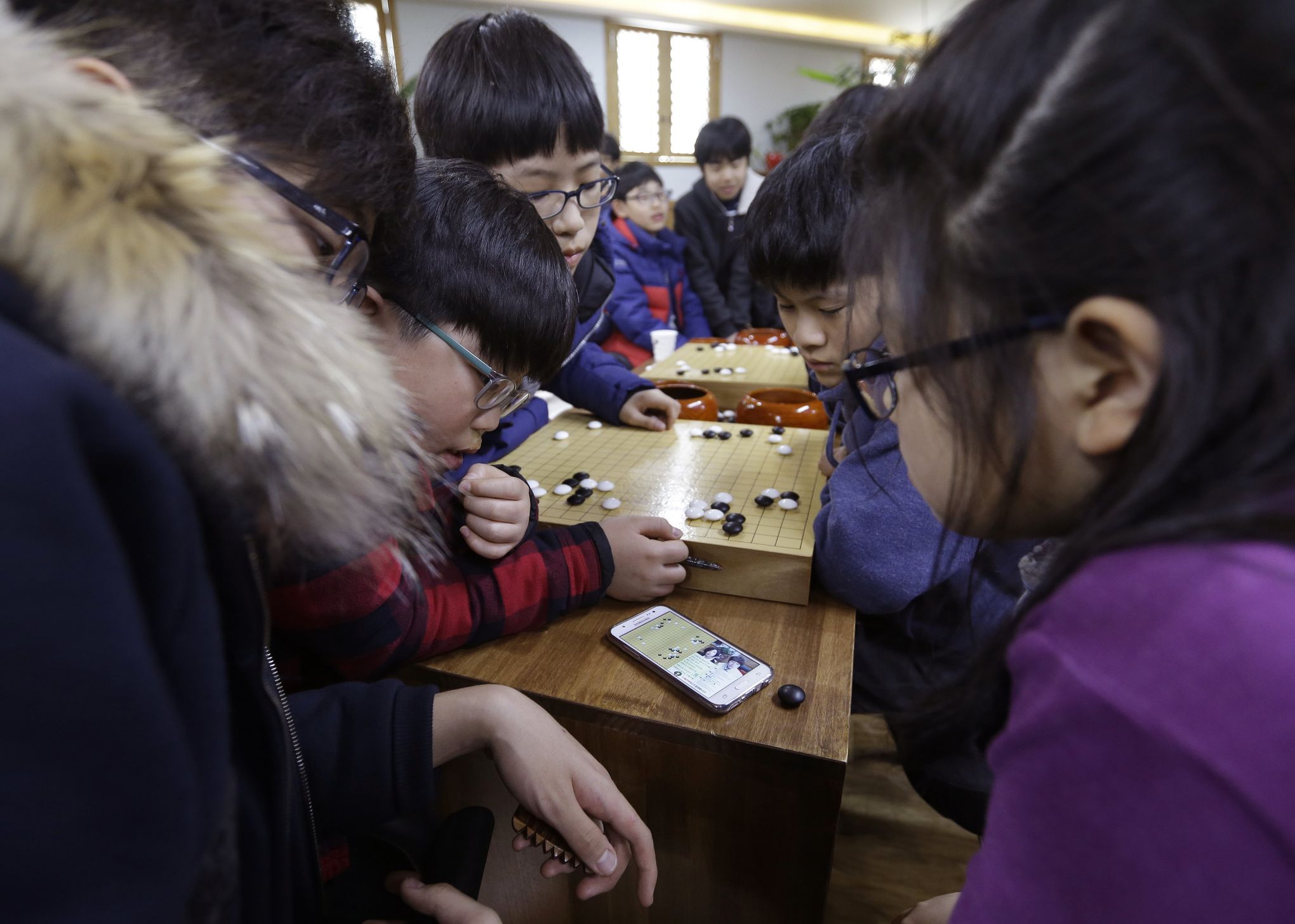 Google artificial intelligence beats champion at world's most complicated  board game