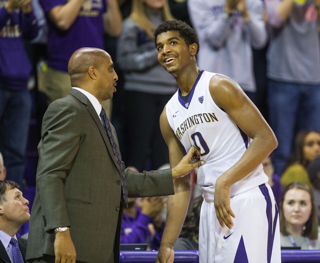 Lorenzo Romar pulls Marquese Chriss late from a game after he scored 29 points against Mount St. Mary’s on Nov. 19. (Dean Rutz / The Seattle Times)