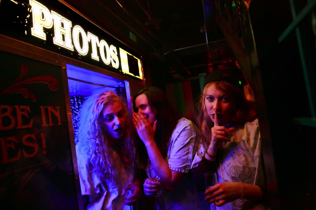 Wearing maternity gowns, from left, Julia Shapiro, Stacy Peck and Bree McKenna form the Seattle band Childbirth. Their album “Women’s Rights” features songs titled “Tech Bro” and “Siri, Open Tinder.” (Erika Schultz/The Seattle Times)