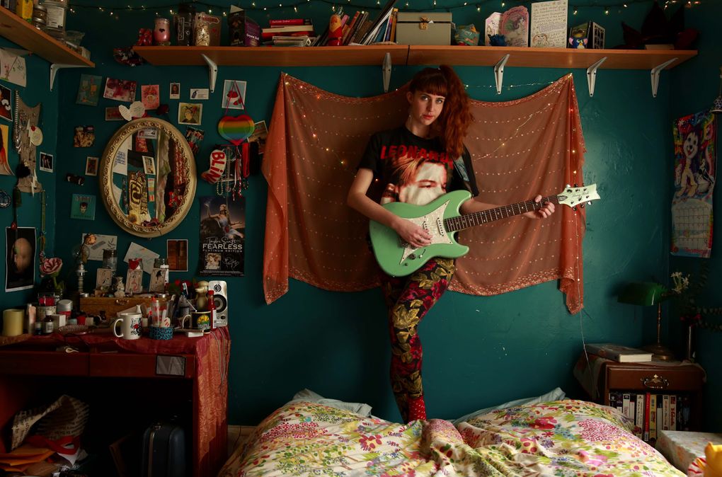 Robin Edwards, aka Lisa Prank, 26, is shown in her bedroom at the Central District house she shares with other musicians. Originally from Denver, she describes her music as “Trapper Keeper pop punk.” Her new record, “Adult Teen,” will be released in June. (Erika Schultz/The Seattle Times)