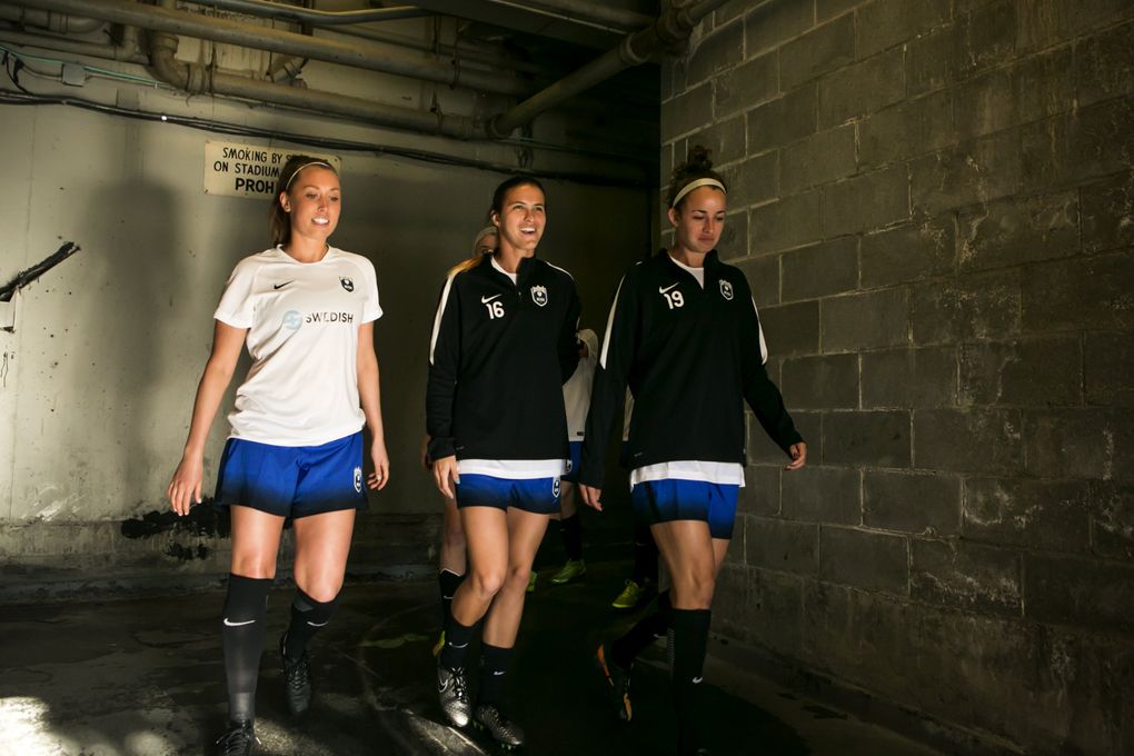 Rookie left back Carson Pickett, middle, starts with the Seattle Reign for a home preseason friendly against the University of Washington women’s team on April 9, 2016. (Bettina Hansen/The Seattle Times)