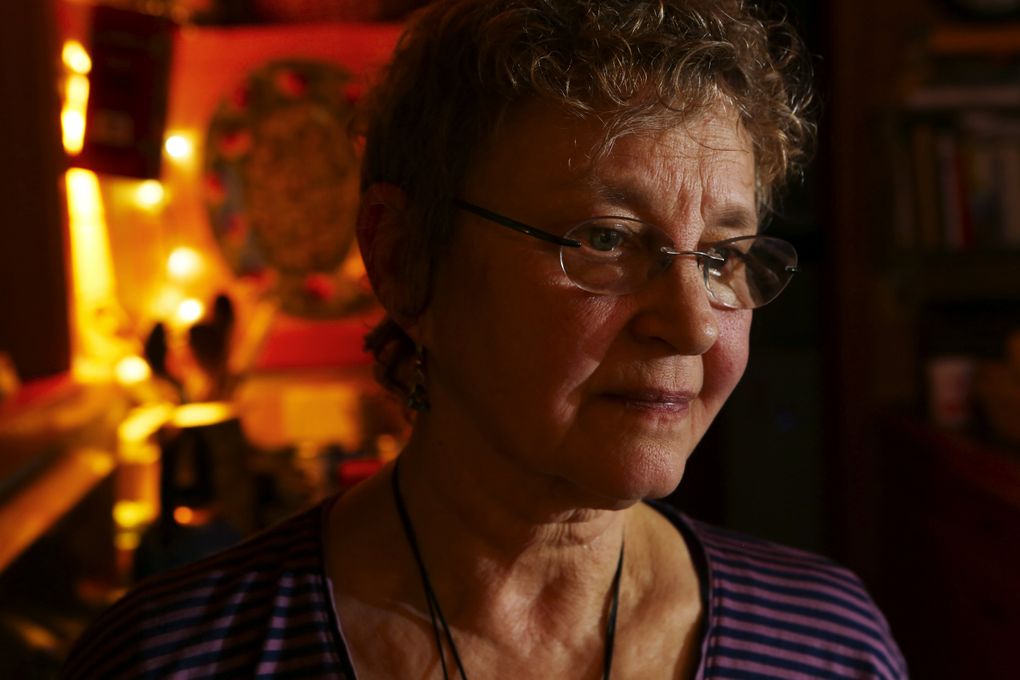Cynthia Dilling in her kitchen March 10 at dinner time. On this night, the Growlers’ low rumble could be heard for hours during a windstorm. (Ken Lambert/The Seattle Times)