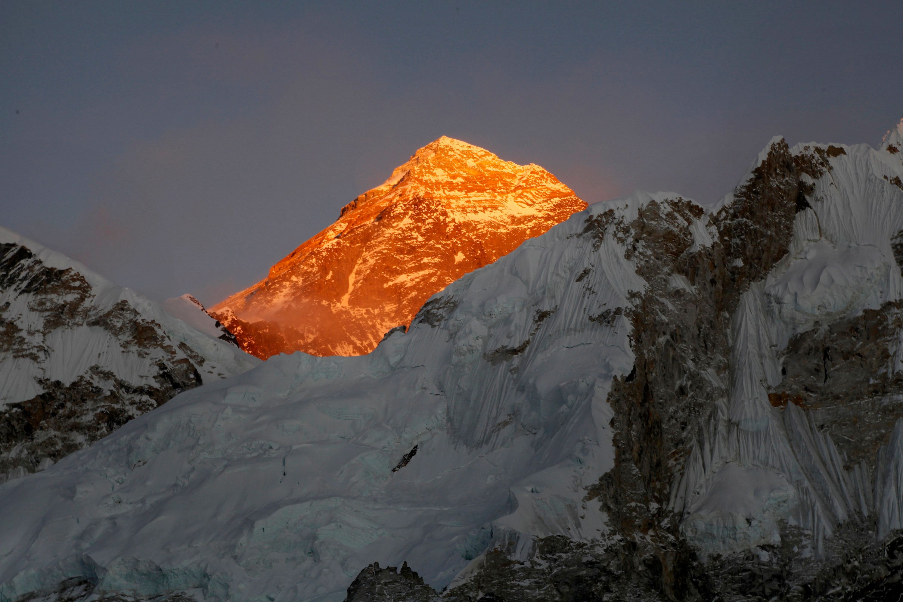 Despite back-to-back disasters, climbers return to Everest | The