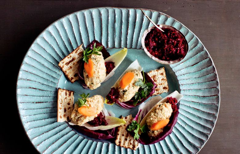 Homemade gefilte fish, simmered in a vegetable-court bouillon. (Gabriela Herman / The New York Times)