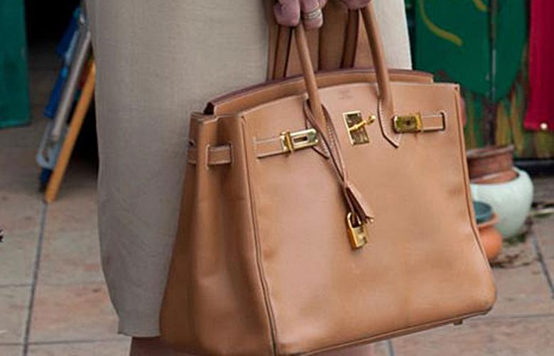 To handbag' is a verb — plus 12 other facts about women's most