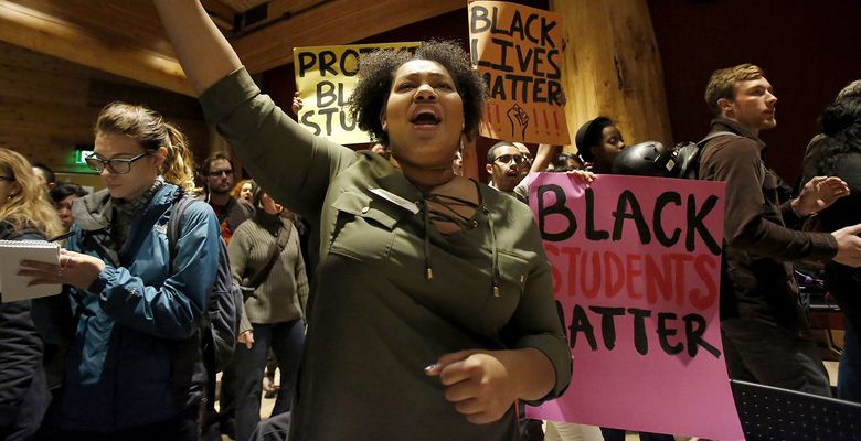 Mariama Suwaneh chants “Black lives matter!” as a rally takes over a race and equity meeting at the University of Washington.  (Sy Bean/The Seattle Times)