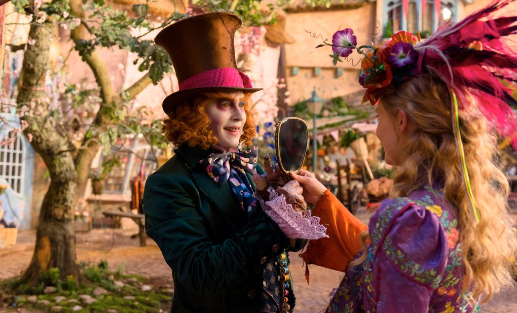Mia Wasikowska and Johnny Depp star in “Alice Through the Looking Glass.” (Peter Mountain)