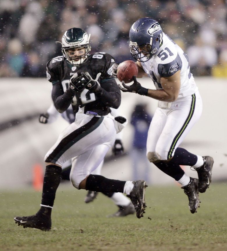 Seattle Seahawks' Lofa Tatupu on the sidelines in the game against