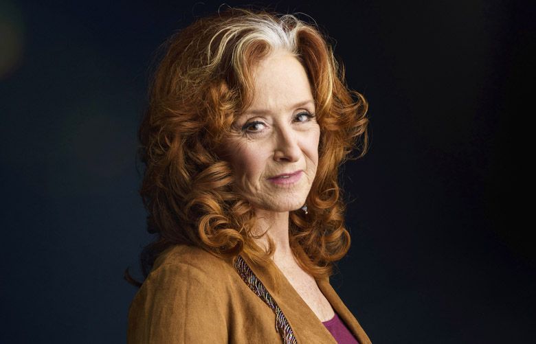 In this March 7, 2016 photo, singer Bonnie Raitt poses for a portrait in New York to promote her new album, Dig In Deep.” (Photo by Drew Gurian/Invision/AP) NYET257