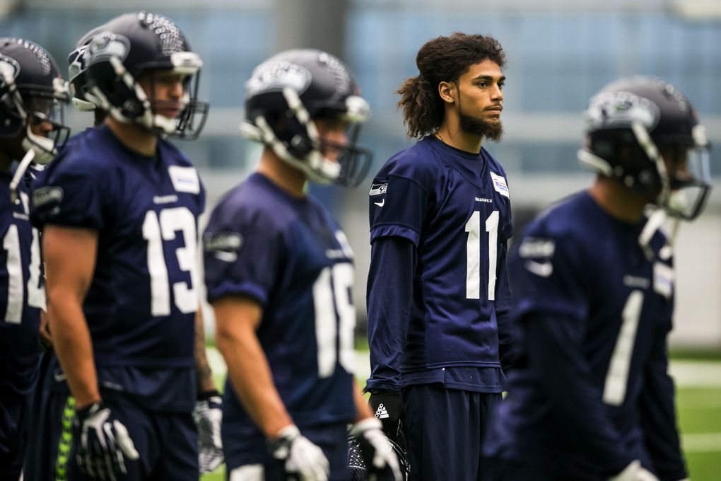 Wide receiver Kenny Lawler watches Seahawks rookie minicamp at the Virginia Mason Athletic Center Sunday May 8, 2016.