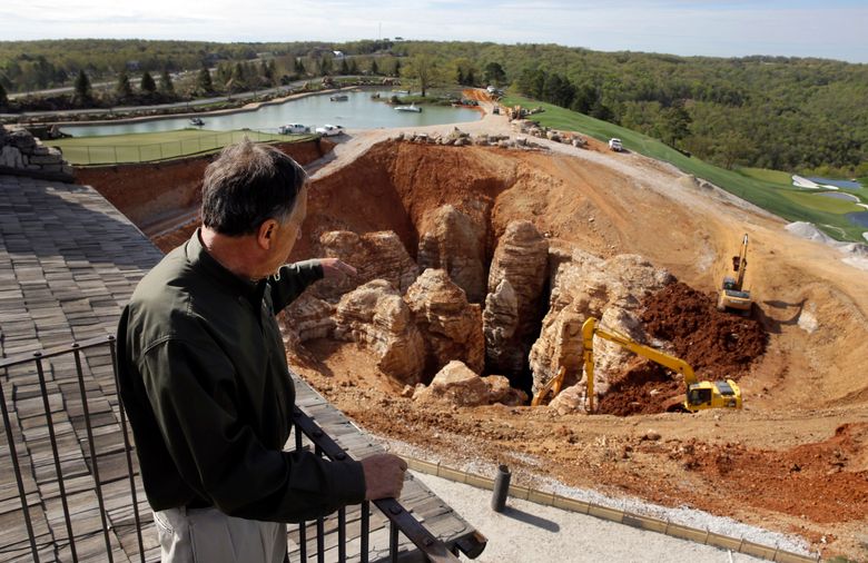 Sinkhole spurs search for cave by Bass Pro Shops founder
