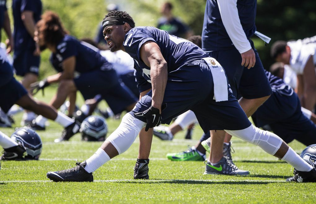 Running back C.J. Prosise works out with the Seahawks Friday at rookie minicamp. (Dean Rutz/The Seattle Times)