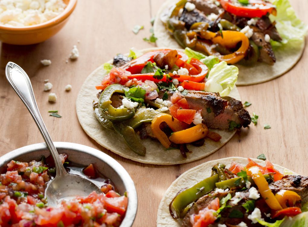 Cumin- and chili-rubbed skirt steak can be used for steak fajitas. (RIKKI SNYDER/NYT)