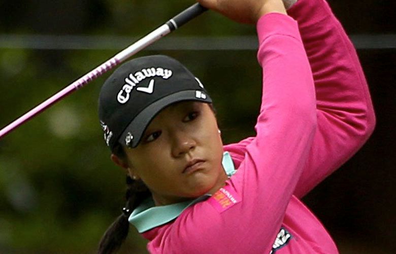 Lydia Ko from New Zealand hits from the fairway on the fifth hole on day two of the KPMG Women’s PGA Championship on Friday, June 10, 2016, at Sahalee Country Club in Sammamish.