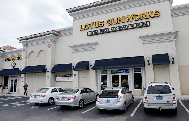 Lotus Gunworks is shown, Thursday, June 16, 2016, in Jensen Beach, Fla. The co-owner of the store, Robert Abell told reporters that Pulse nightclub shooter Omar Mateen came in roughly five weeks before the nightclub shootings asking to buy body armor and about 1,000 rounds of ammunition. The young man left empty-handed when an employee told him the store didn’t have either, and the worker called the FBI to report a suspicious person. But nobody knew his name until after Mateen was identified in the Orlando nightclub attack. (AP Photo/Wilfredo Lee)