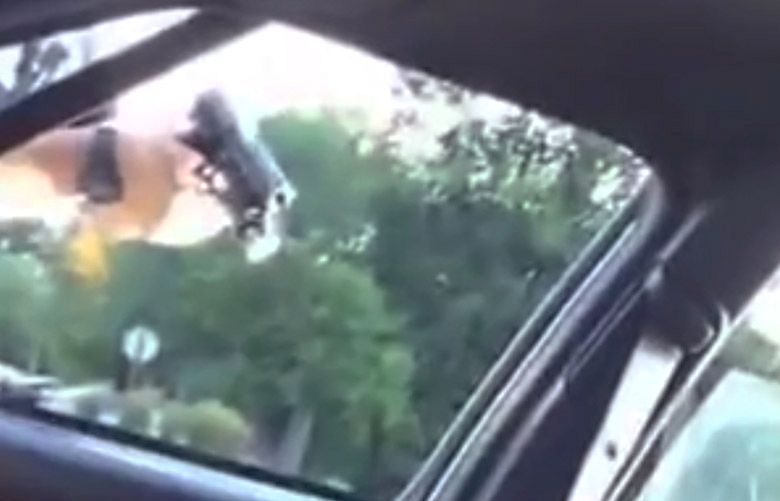 EDS NOTE: GRAPHIC CONTENT – This still image taken from video by Diamond Reynolds shows a police officer pointing a gun at her boyfriend, Philando Castile, during a traffic stop on Wednesday, July 6, 2016 in Falcon Heights, Minn. The officer shot Castile, and Reynolds apparently livestreamed the aftermath on Facebook from the passenger seat. As the video and word of the shooting spread, scores of people gathered at the scene and outside the hospital where Castile died. (Diamond Reynolds via AP)