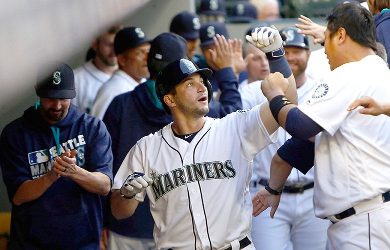 Seattle’s Mike Zunino (3) celebrates with teammates after hitting a homer in the second inning, brining the score to 5-0, during the game three of the series between the Seattle Mariners and the Baltimore Orioles at Safeco Field, Saturday, July 2, 2016. The Mariners are 2-0 in the series.