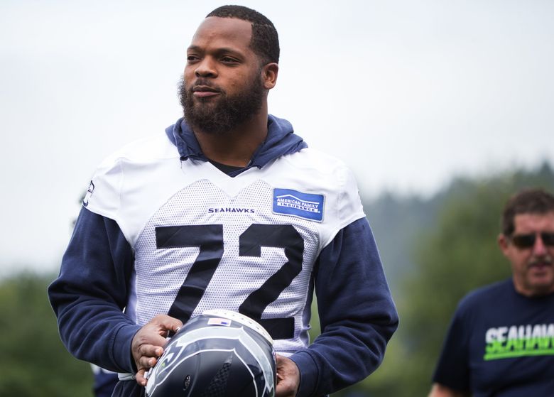 Seahawks' Michael Bennett explains why he stood up during the