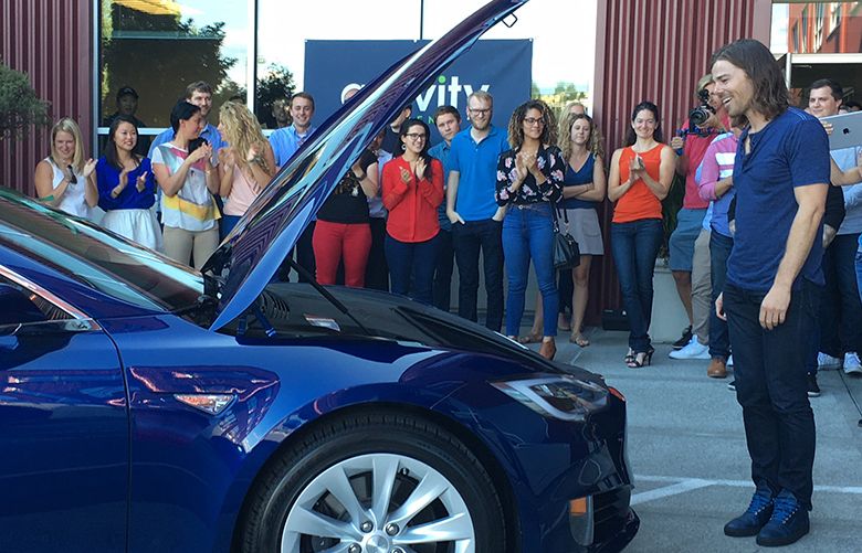 Gravity Payments Team Gets Ceo Dan Price A Gift A Tesla The Seattle Times Gravity Payments Team Gets Ceo Dan Price A Gift A Tesla The Seattle Times