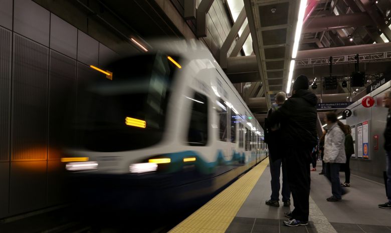 A Sound Transit train arrives at the Capitol Hill Station about every 10 minutes.  (Alan Berner/The Seattle Times)