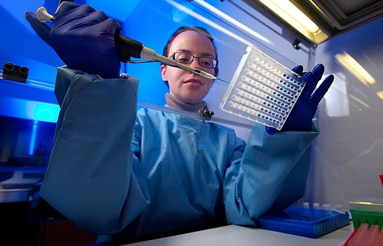 Tatiana Travis runs a test to detect drug-resistant pathogens at the Centers for Disease Control and Prevention. (CDC/MCT) 1135719