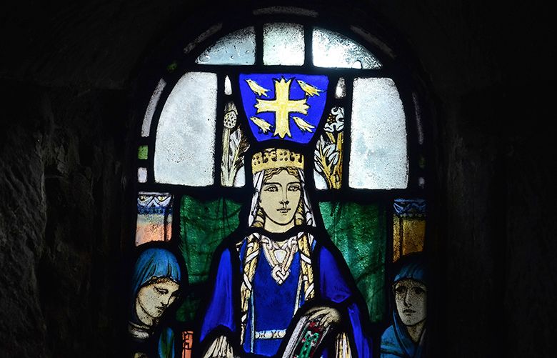 St. Margaret’s Chapel — which includes this stained-glass image of St. Margaret — in Edinburgh Castle is said to date to the 12th century, and is often credited as the oldest surviving building in Edinburgh. (Chris Reynolds/Los Angeles Times/TNS) 1186407
