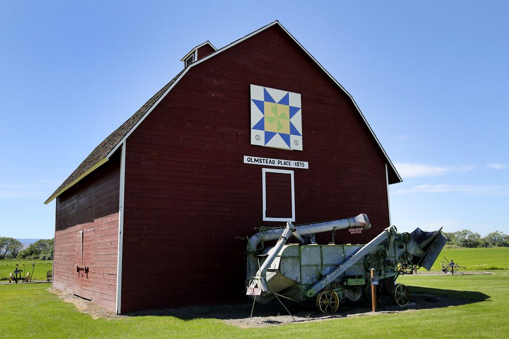 This red barn is visible from the road at Olmstead Place State Park. The image of a quilt square on the barn’s side is part of the Kittitas County Barn Quilt Trail (see story). (Johnny Andrews/The Seattle Times)