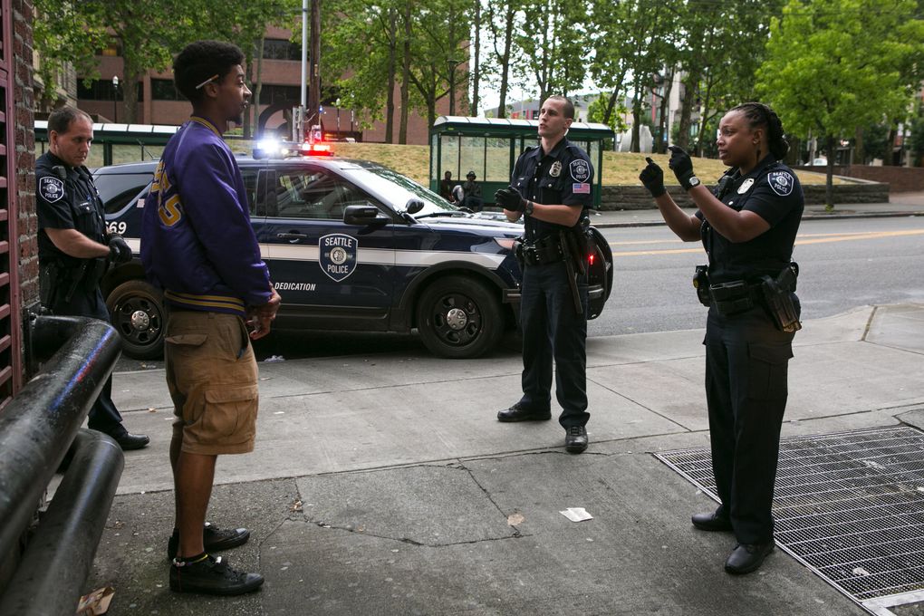 Officer Melisande Manning talks with a man who had been seen drinking from a brown paper bag. The man peppered Manning with questions about NBA basketball, then took off jogging down an alley. “You approached me; I didn’t approach you,” Manning told the man. “You drink out of a paper bag; it is in fact alcohol … secondly, you’re running!” She said she would have just given him a verbal warning but wrote him a ticket, for less than $30, for public consumption of alcohol, on principle. “You’re committing an infraction which is against the law, in front of me, which is disrespectful,” she told him, while handing him the ticket. “I respect you if you respect me, OK?”
