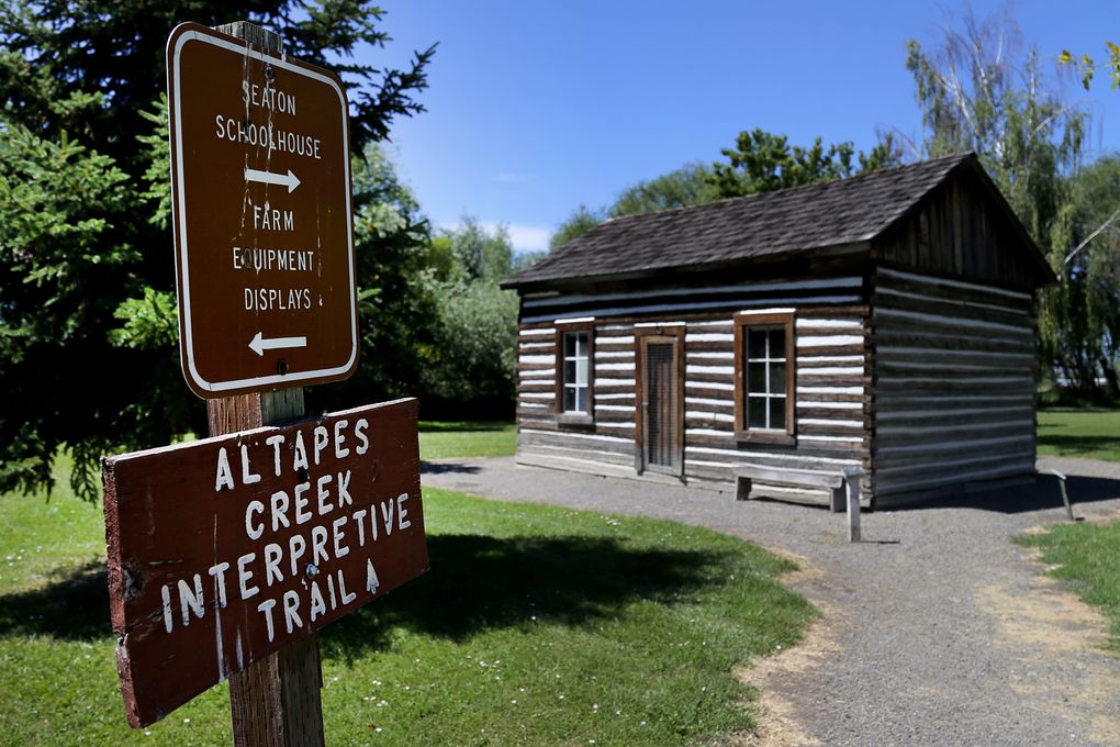 The Seaton Cabin Schoolhouse, a log cabin structure originally built in the 1870s, is one of the attractions at Olmstead Place State Park, just east of Ellensburg. (Johnny Andrews/The Seattle Times)
