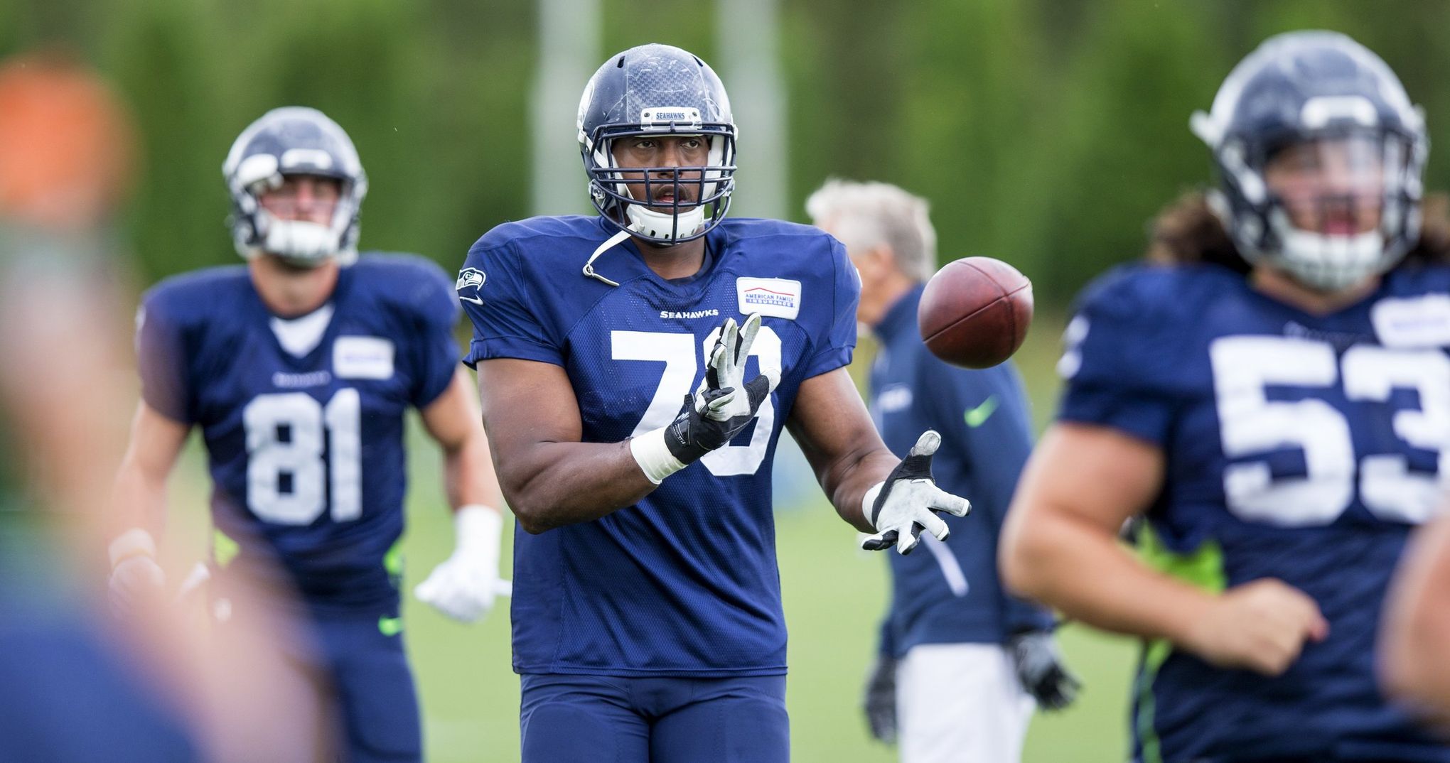 Seahawks end day before training camp with flurry of roster moves and  restructured contract