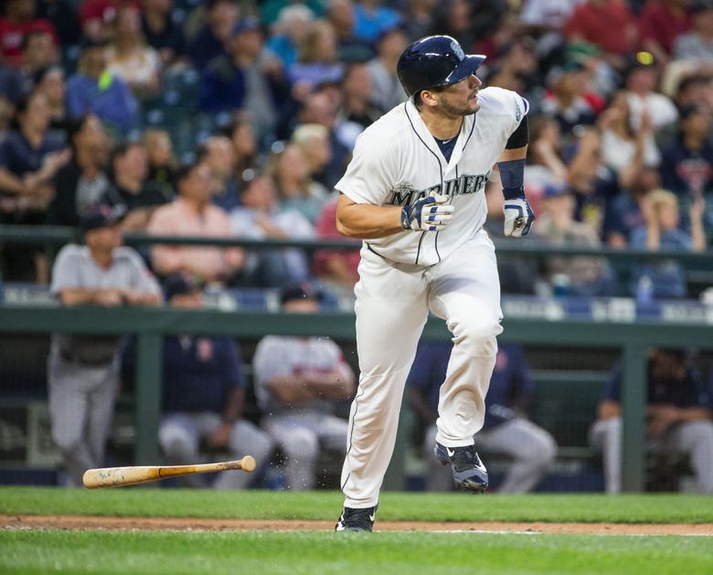 Mike Zunino follows the flight of the ball on his 5th home run of the season, a solo shot off Boston’s Rick Porcello in the 6th inning that would give Seattle a 2-0 lead over the Red Sox.   (Dean Rutz / The Seattle Times)